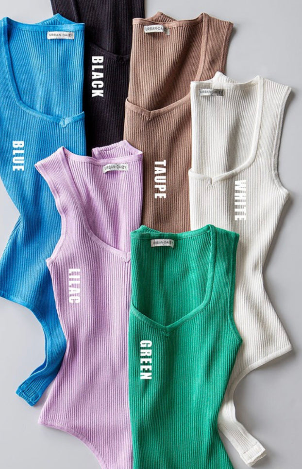 a group of sweaters that are all different colors